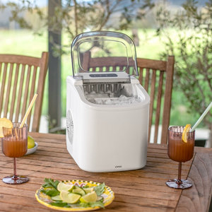 Machine à glaçons compacte automatique capacité 12 kg par jour réservoir 1,2 litres
